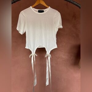 Simone Rocha white bow top.